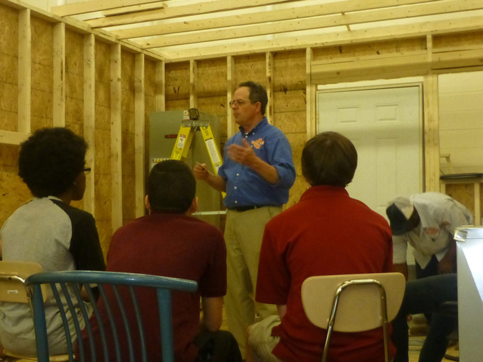High school students learning about HVAC